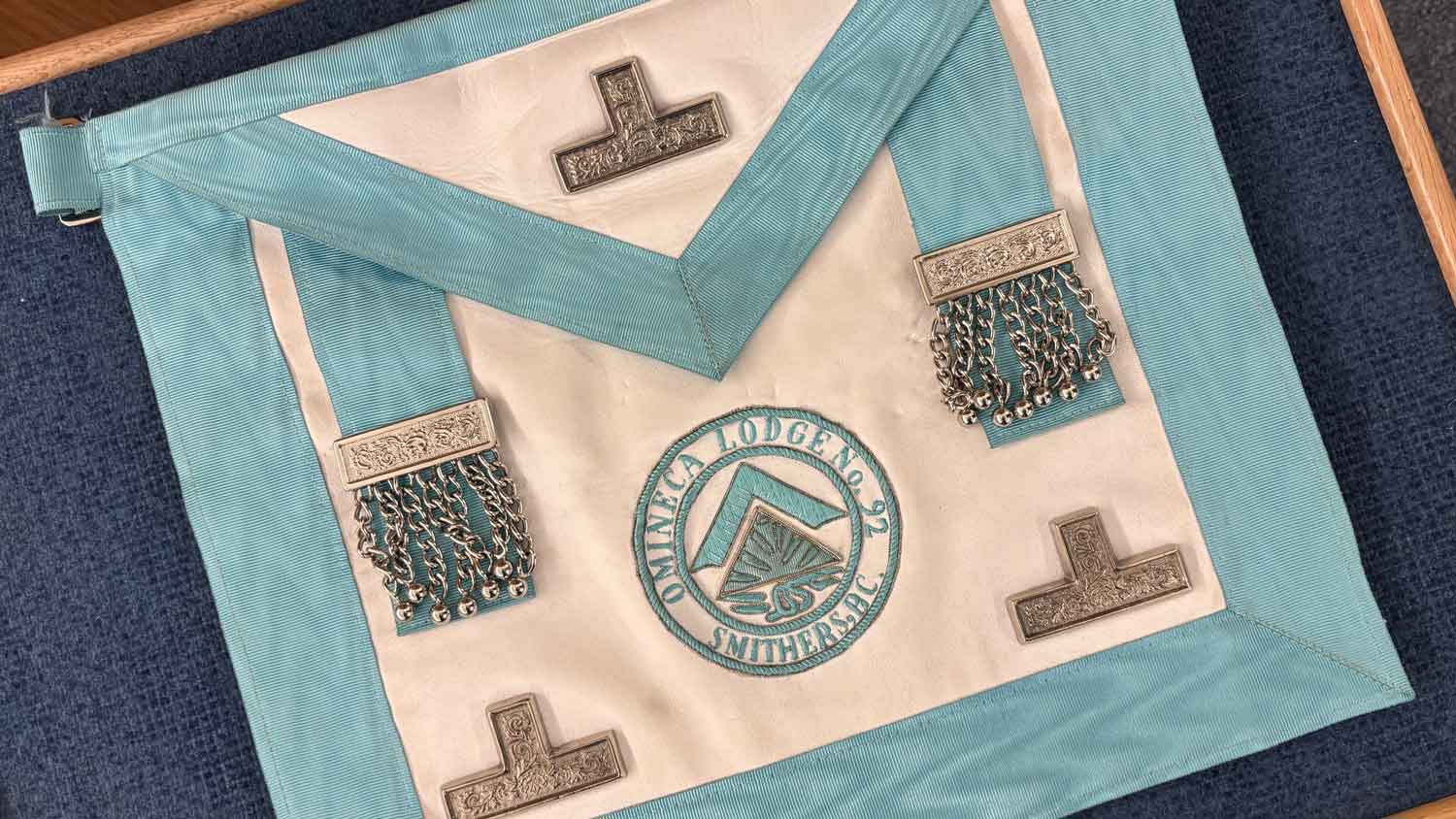 a photograph of an masonic apron. omineca lodge 92